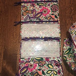 Vera Bradley toiletry bag only.